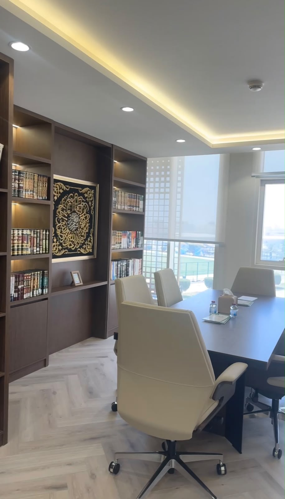 The firm's meeting room in Bu Hamour, with its legal library and the Court of Cassation collections